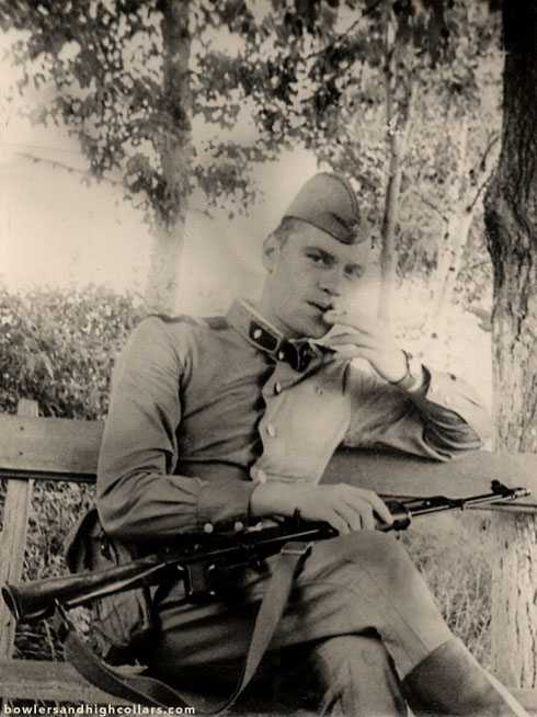 1940s soldier with rifle. Snapshot. Private Collection.