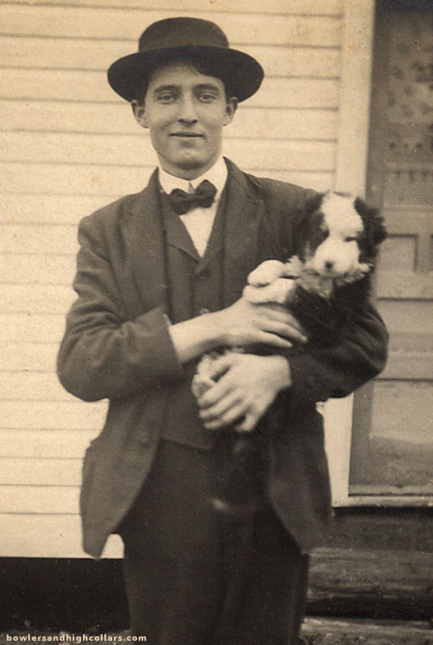 rppc-puppy-young-man-detail